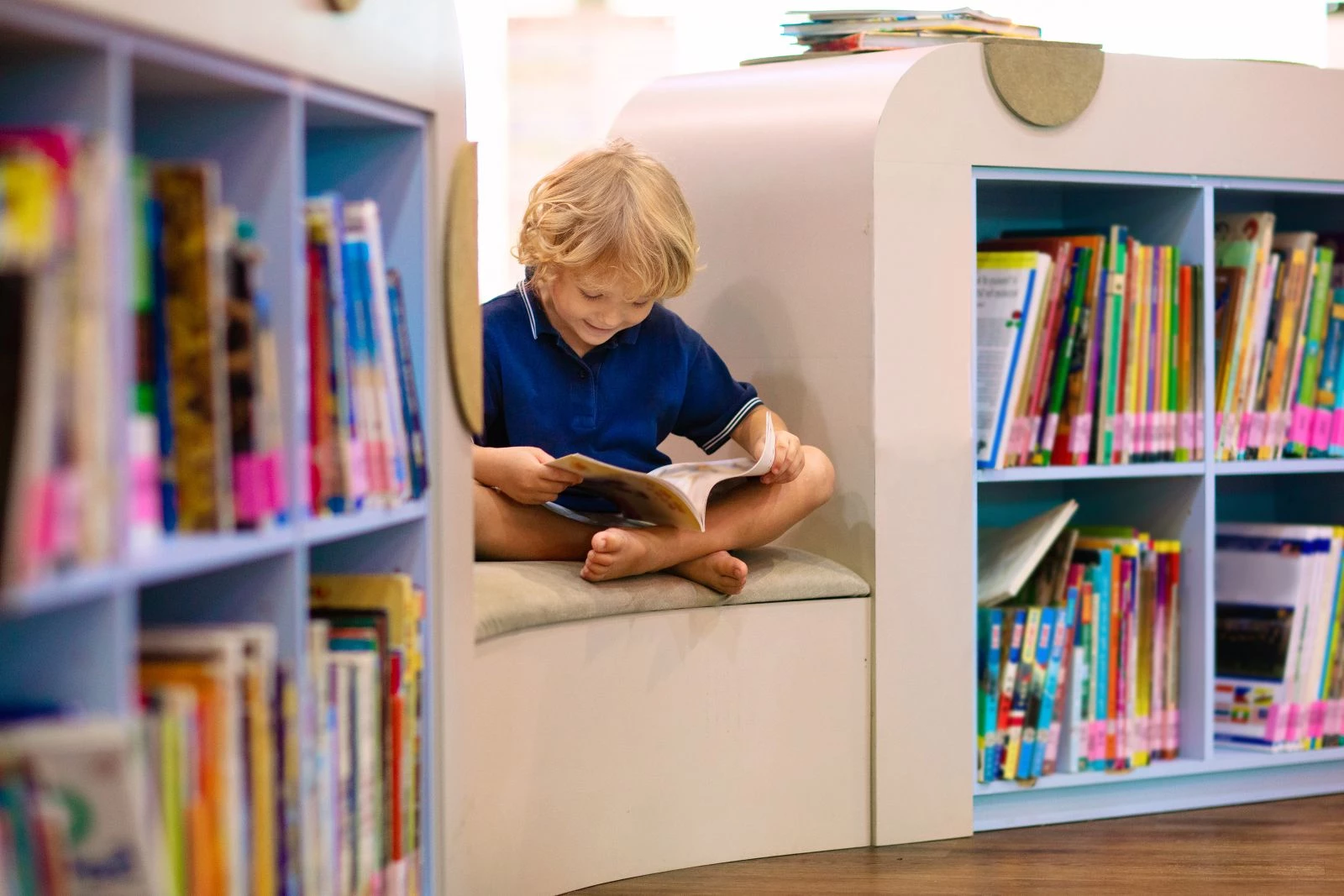 Child Reading In The Library Shutterstock 1648927732 Low Res